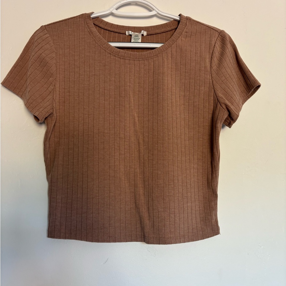 Brand is Bozzolo. Size L. Color is tan. Ribbed material.